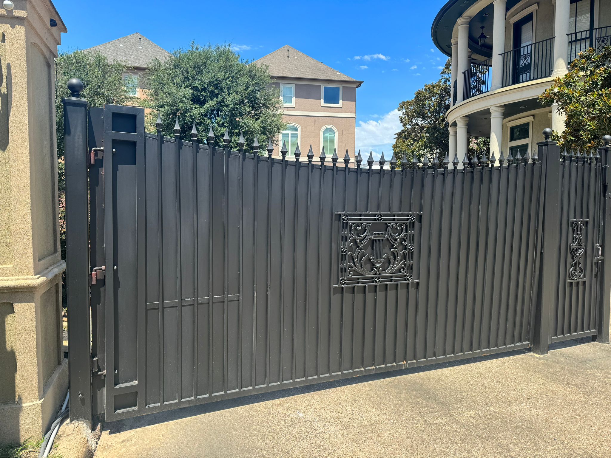 Completed modern horizontal privacy driveway gate