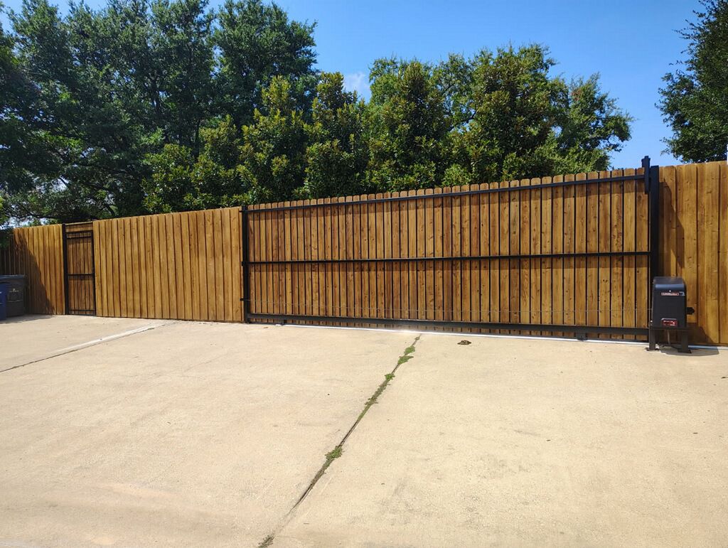 Wood sliding driveway gate with an automatic operator